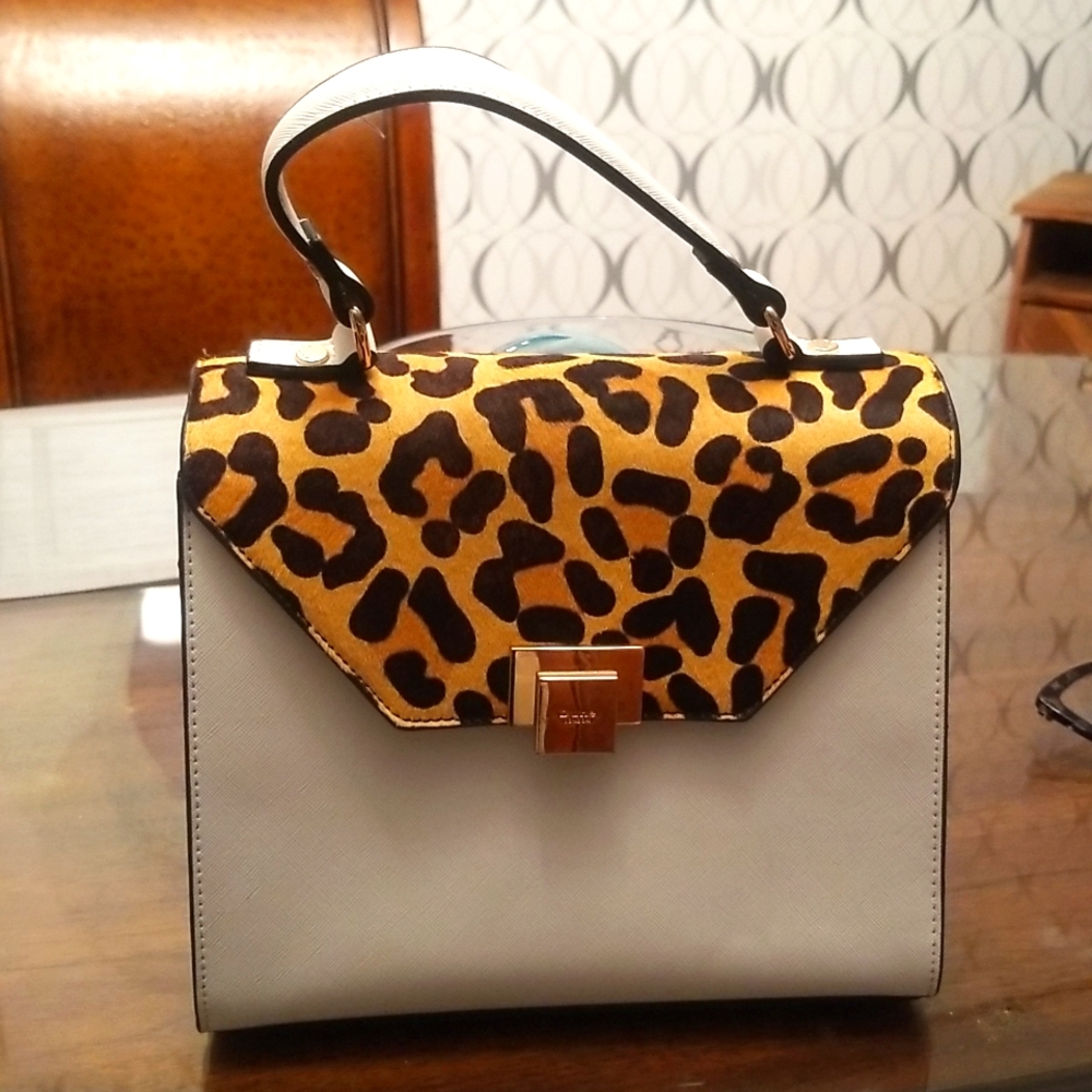 White and leopard purse